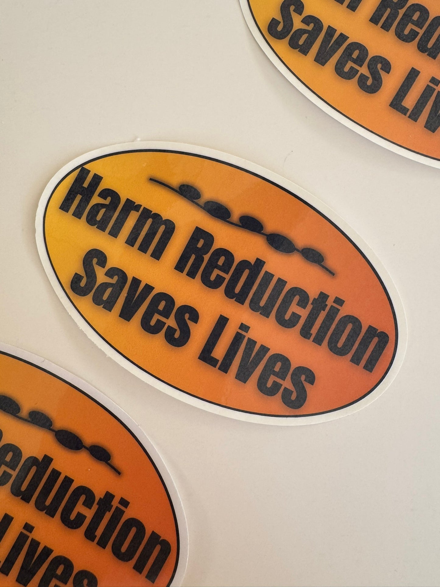 Harm Reduction Saves Lives Sticker - Large Oval (Orange Gradient)